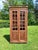 Bookcase with two glass doors, perfect for displaying your books or other objects. The sides are paneled. Three shelves....