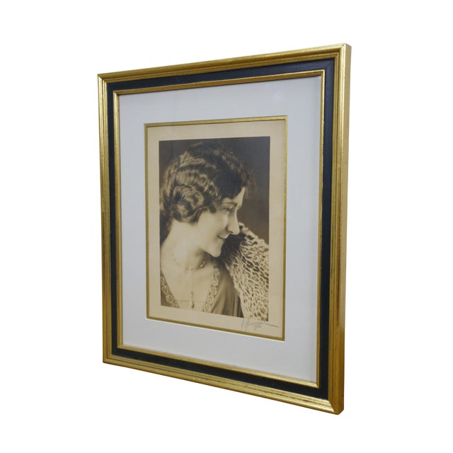 Antique circa 1920's sepia toned portrait photograph of a woman with finger waved hair and a leopard fur wrap. Signed in...