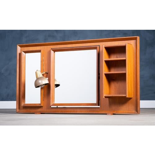 Beautiful and rare freestanding teak mirror from the 1960s, designed for placement on a table, dresser, or sideboard....