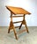 A well-made and heavy duty mid century era drafting table with oak base, original steel hardware and satin oil finish...