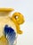 A striking antique Japanese pottery vase featuring a hand-painted golden dragon sweeping across a finely crackled cream...