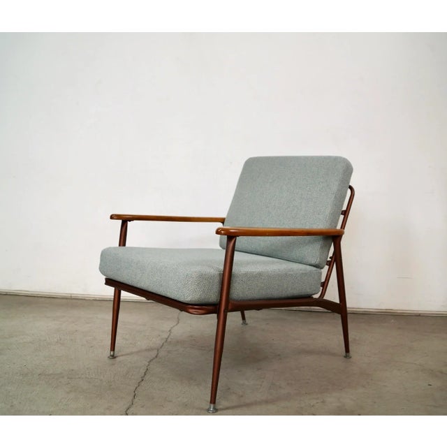 Vintage origina Midcentury Modern lounge chair for sale. Manufactured by Baumritter, and in excellent condition. We had...