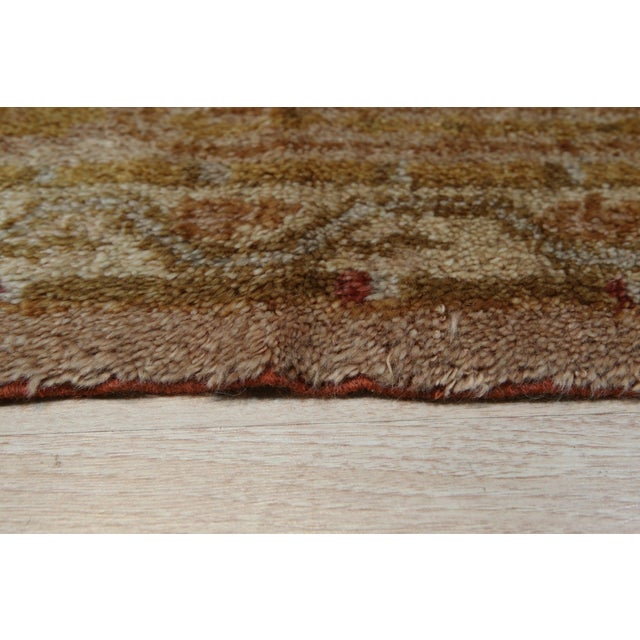 Hand-knotted using luxurious mohair, this 9 x 12 Oushak rug carpet is a refined selection from our contemporary room-size...