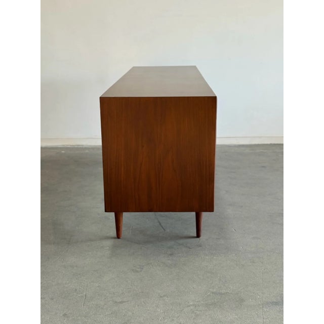 W82.5 D20 H30 Fully restored walnut dresser by Drexel. Unit is strucutrually sound and fully functional. Item shows well...