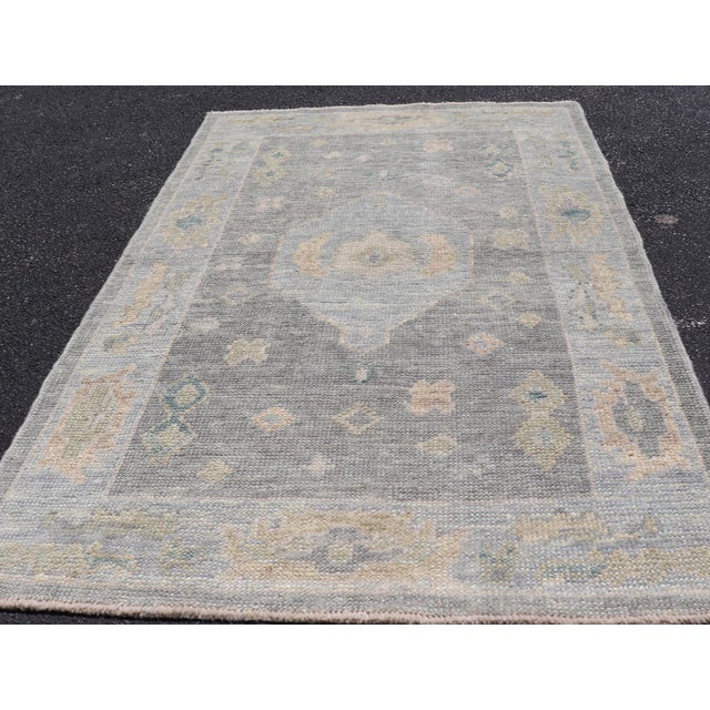 Turkish Oushak Rug With Soft Gray Field and Pale Blue Medallion For Sale In Atlanta - Image 6 of 12