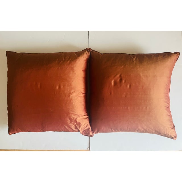 Gorgeous pair of 22” copper taffeta silk pillows with feather down inserts.