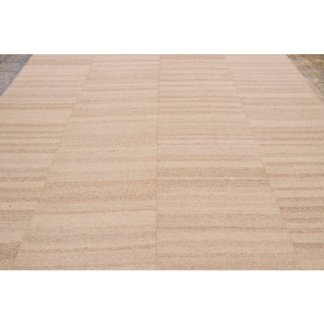 Handwoven from wool and originating circa 1950-1959, this 9x13 vintage Turkish kilim joins Rug & Kilim’s Kilim & Flat...