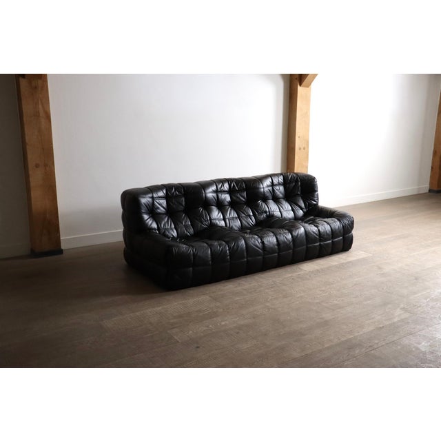 Amazing original Ligne Roset Kashima three seater sofa in black leather by Michel Ducaroy, France 1970s. The nice...