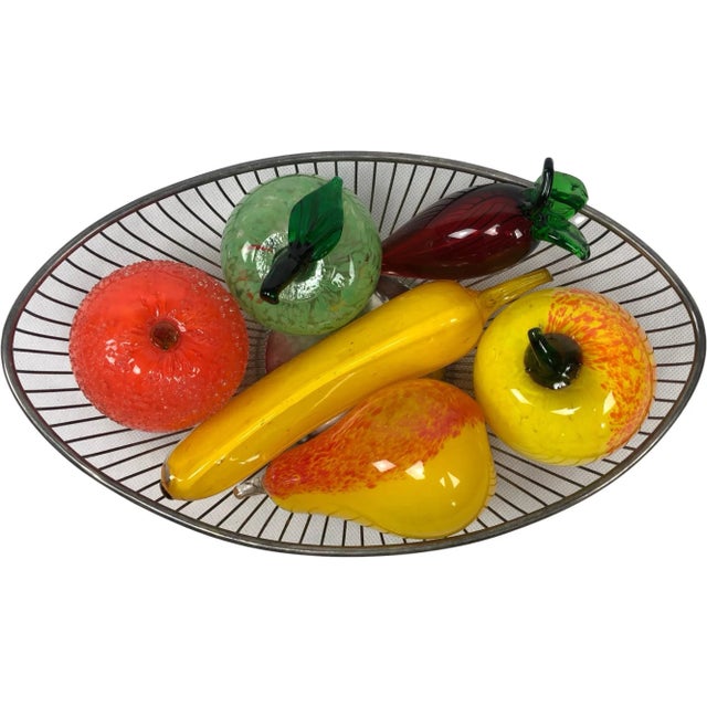 The set does not include a paddle. Dimensions given for an apple. The whole thing can be a great decoration for a modern...