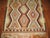 A vintage geometric Turkish Kilim scatter rug from the mid-20th century. Measures: 4'1'' x 6'3''.
