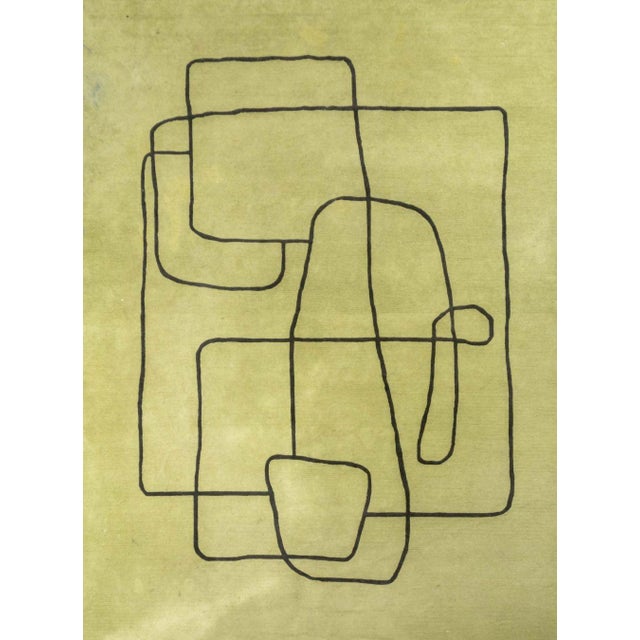 Surya "Rossi" Hand-Tufted Wool Carpet, with white abstract design on green ground, label to underside. 11' 11" L x 8' 11"...