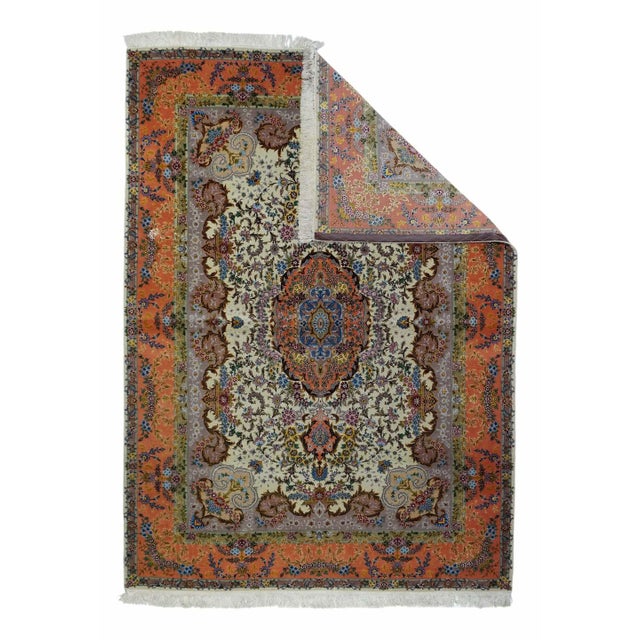 This modern tour-de-force NW Persian finely woven city scatter shows an old ivory field densely covered with smallish...