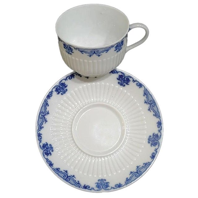 Set of 8 cups and saucers by Saint Cloud by Ceralene from Limoges France Measurements: Saucer 6 1/4", Cup 3 1/2" opening x...