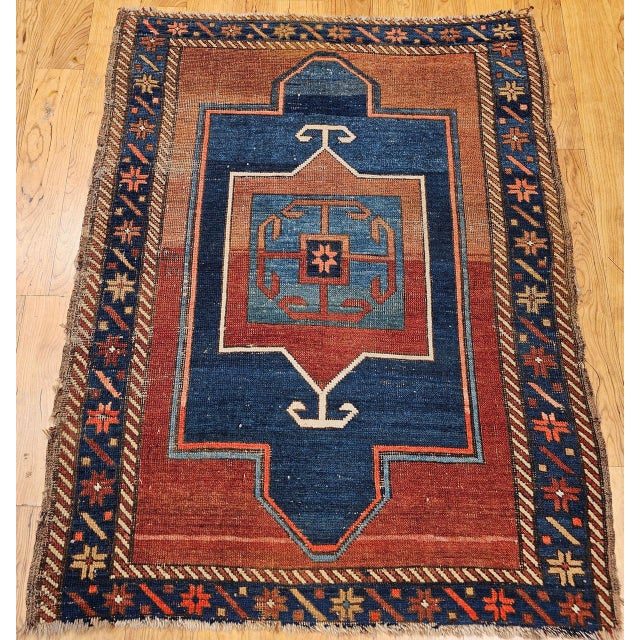 This exceptional 19th century Fachralo Kazak prayer rug is a rare and collectible example of high-mountain tribal weaving,...