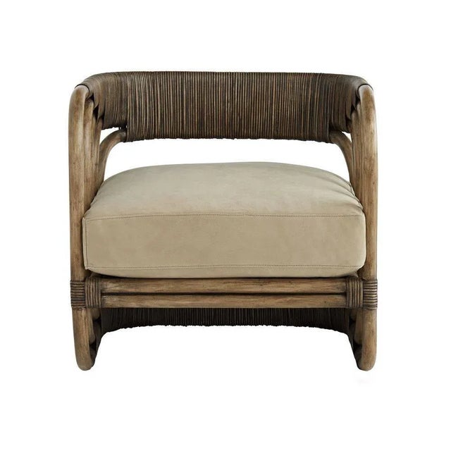 Concentric layers of thick, palm gray rattan poles frame the foundation of this elegantly eccentric and wildly organic...