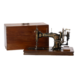 Wonderful Frister and Rossman Sewing Machine in Walnut Case