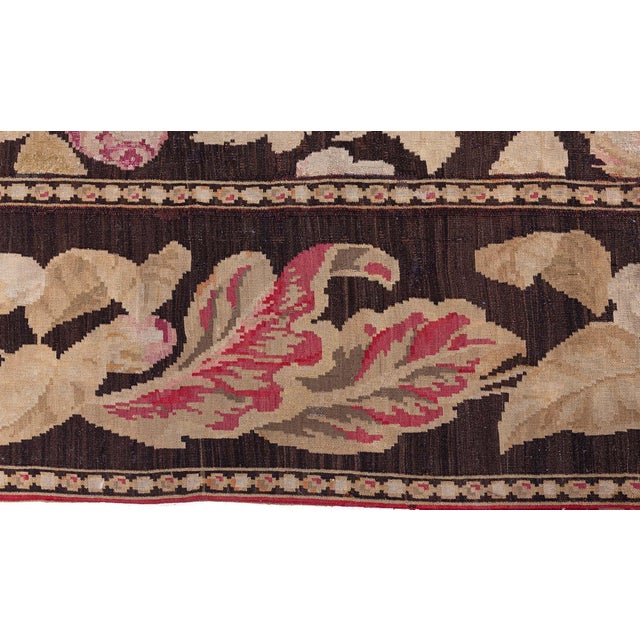 This exquisite 1880s Russian Bessarabian flat-woven rug is a testament to the regions masterful textile artistry,...