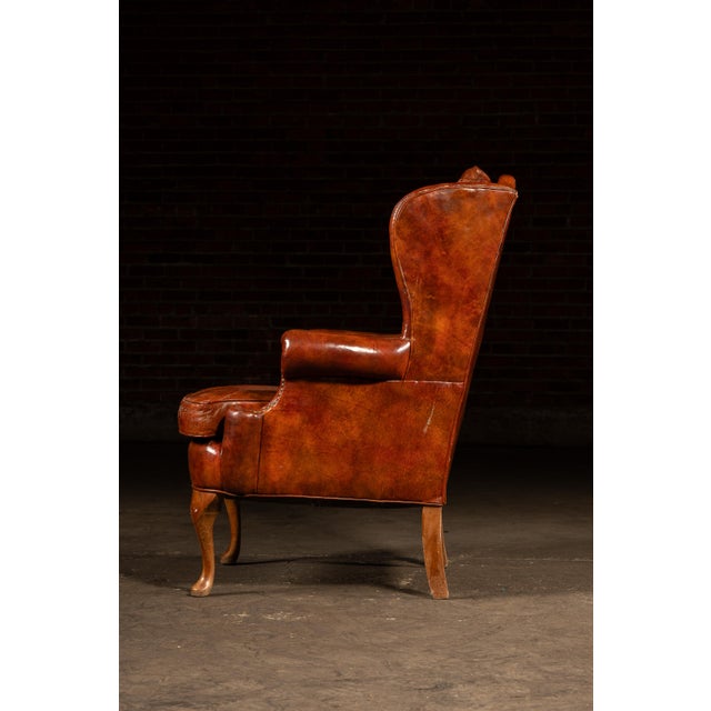 Wood Mid 20th Century Tufted Leather Wingback Armchair in Burnt Amber For Sale - Image 7 of 17
