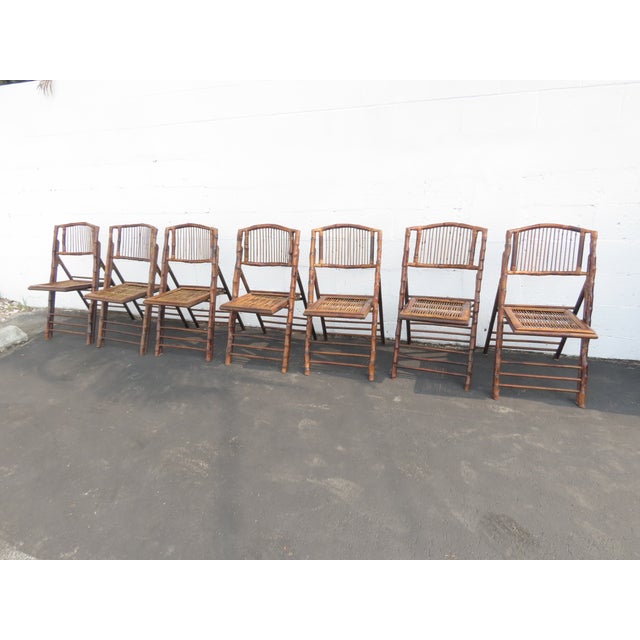 This Set of Five Folding Dining Chairs is made out of wood, and bamboo. The chairs fold and it make it a great set for a...