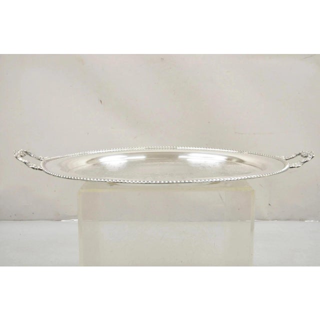Vintage English Victorian Oval Silver Plated Serving Platter Tray by Victoria. Circa Mid 20th Century. Measurements: 2" H...