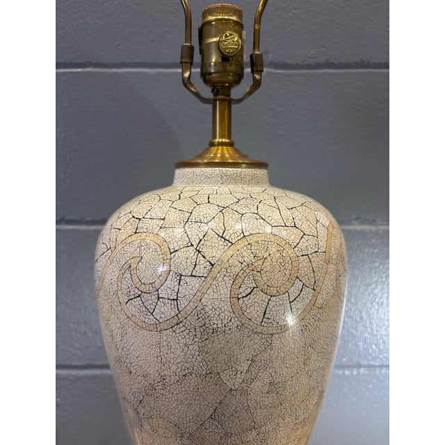 An elegant vintage table lamp by Maitland Smith featuring a hand applied crushed eggshell veneer with a warm ivory finish...