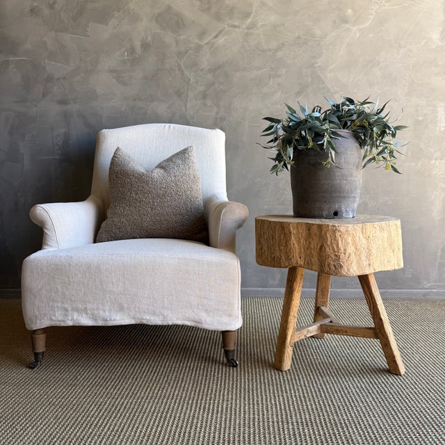 This solid stump slice was turned into a side table or stool. The solid thick top has a beautiful movement with unique...