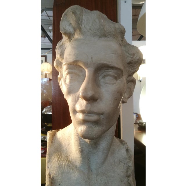 Marble sculpture (attributed) to Alfredo Pina, male head. On the back there is a carved signature that appears to be that...