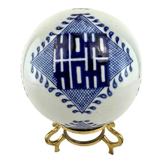 Vintage Chinoiserie Blue and White Carpet Ball With Brass Stand For Sale