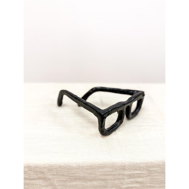 A striking and unique vintage sculpture titled “La Mirada” by Manuel Ferreiro, featuring an artistic bronze rendering of...