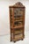 Antique Oak Victorian Renaissance Glass Door Carved Curio Corner China Cabinet. Item features carved Northwind face...