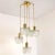 A beautiful and high quality five-tier textured hand blown glass and brass cascading chandelier, made in austria in the...