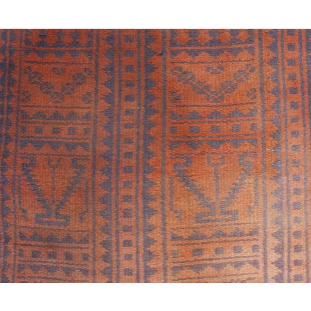An early 20th Century Persian Savek Kilim rug, woven with naturally dyed cotton, with a beautiful all-over geometric...