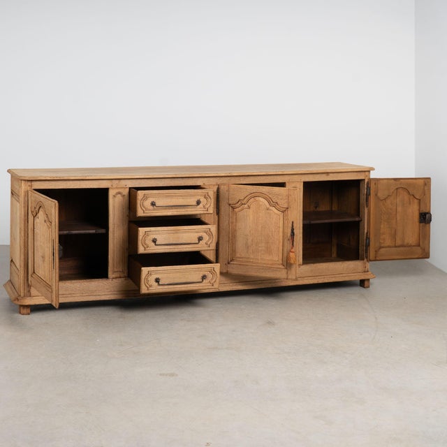 Late 19th-century French oak sideboard, bleached to create a lighter, softened finish well suited for modern interiors....