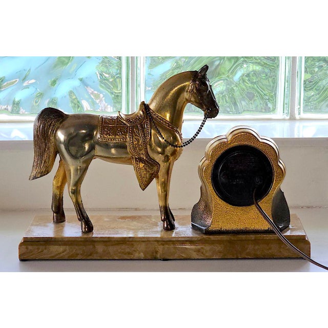 Discover a striking piece of Americana with this vintage 1940s mantel clock by United Clock Co., Model 315. This all-...