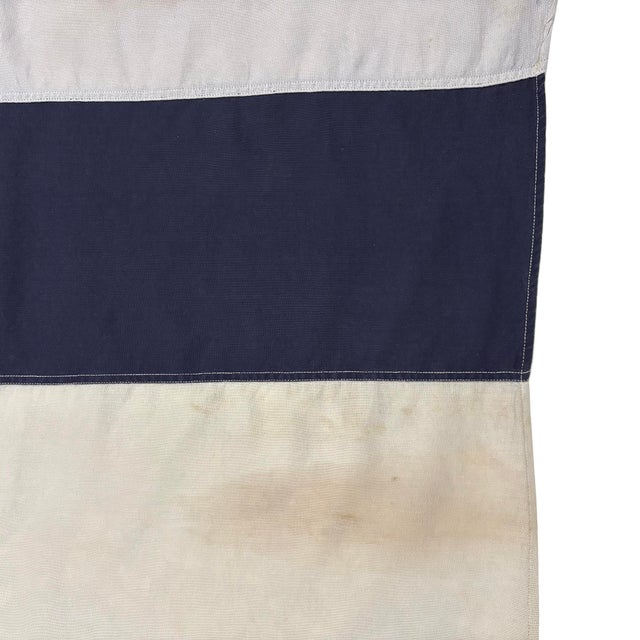 This large vintage signal flag is made from a thin cotton cloth, with fully sewn design. Flag has been newly laundered...