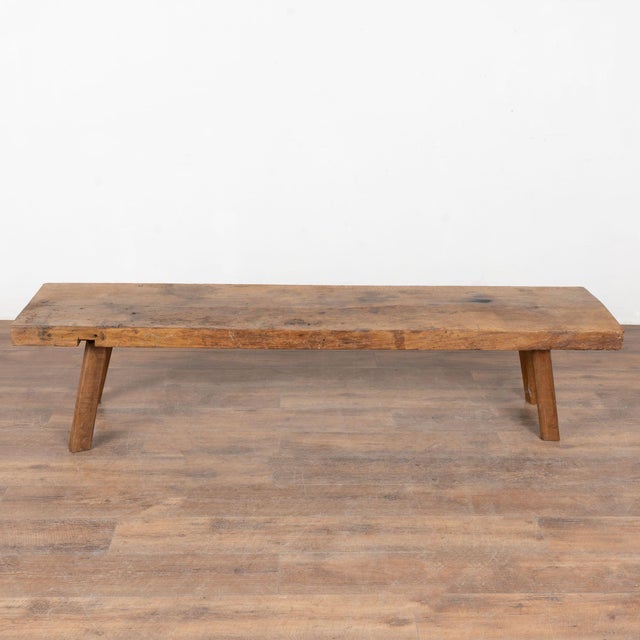 The appeal of this rustic oak coffee table comes from the thick wood top that originally served as a worktable. The...