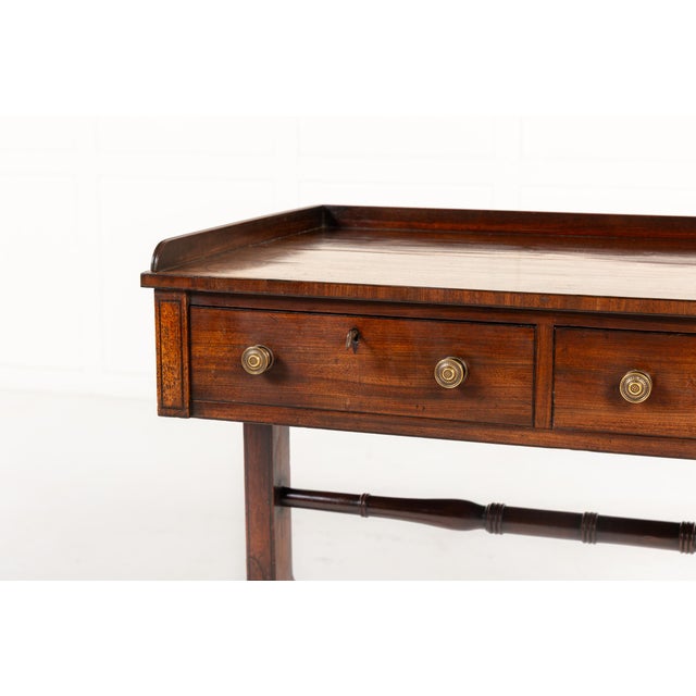 19th Century English Regency Mahogany Writing Table/Side Table. Veneered throughout in finely figured mahogany of lovely...