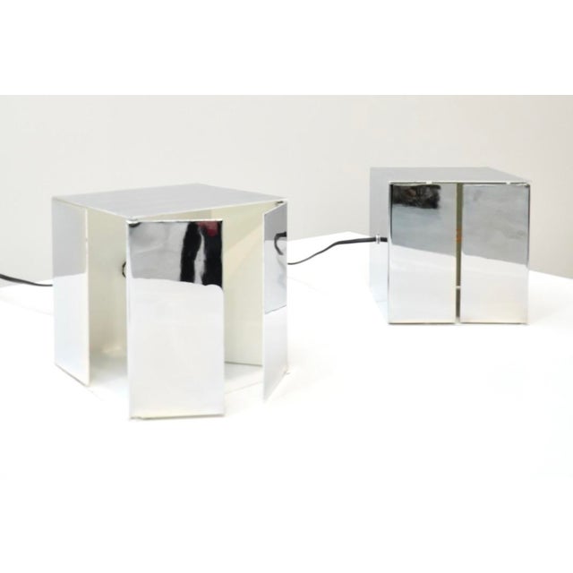 Very rare cubic-shaped table lamps, designed by Paolo Tilche for Sirrah in 1970s Italy. Each lamp features four removable...