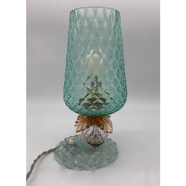 Single table lamp in good overall condition. It dates back to around 1960; the electrical system is new and working. The...