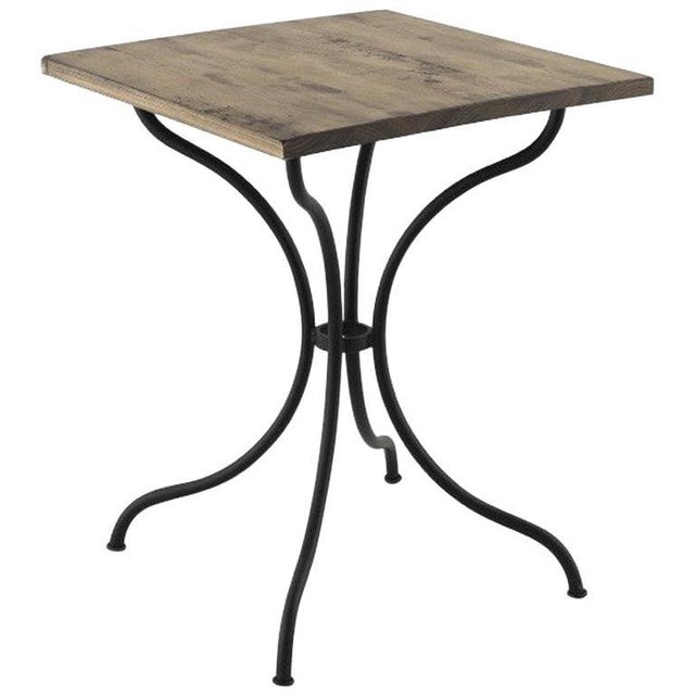 Square French style iron base table with wood top. Garden table or bistro table Ideal for hospitality. Indoor and outdoor.