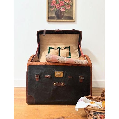 A beautifully preserved 19th century domed travel trunk. The details on this trunk are exquisite, leather bound, linen...