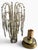 A spectacular vintage Hollywood Regency waterfall table lamp featuring an intricate brass-tone framework suspended with...