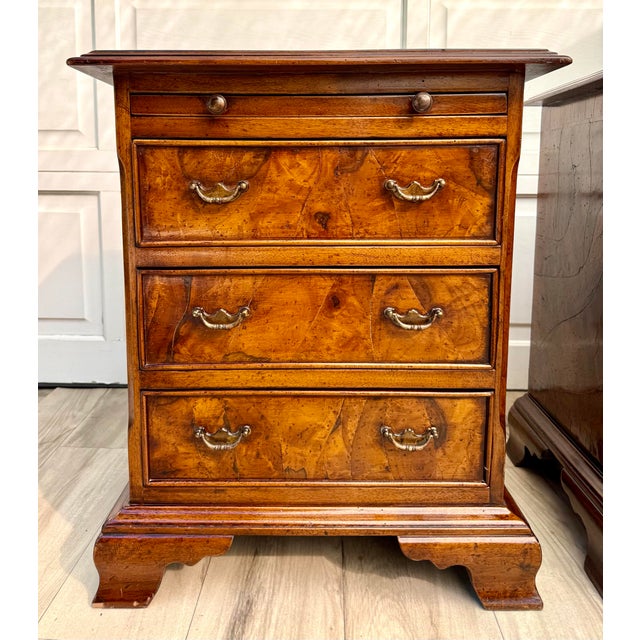 Here is a beautiful pair of vintage Georgian Revival bachelor's chests, believed to date to around the 1950s. Each...
