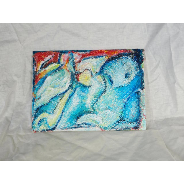 Unnamed: Evocative shape of an underwater creature - shades of blue and white, touches of yellow and red, play of texture...