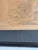 Simon Karczmar Framed Shtetl Lithograph, Jewish Art — Signed in Plate. This expressive work depicts a village scene under...