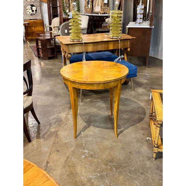 The 19th c. German Biedermeier Walnut Table is a beautifully crafted piece of furniture that embodies the elegance and...