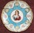 Description: Pair of antique ceremonial plates in polychrome Sèvres porcelain depicting the Sun King, Louis XIV, and...