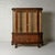This 1930s Belgian buffet china cabinet showcases timeless European craftsmanship through its richly toned oak...