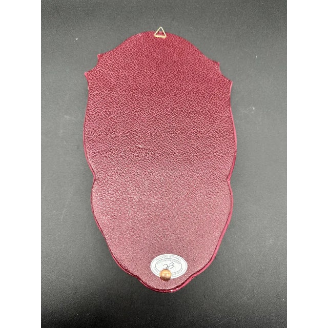 925 sterling silver holy water font. Bas-relief depicting the Madonna with stand covered in burgundy damask fabric. Stoup...