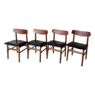 Set of 4 Danish Teak Dining Chairs With Black Leather Seats | Mid-Century Modern 1960s For Sale